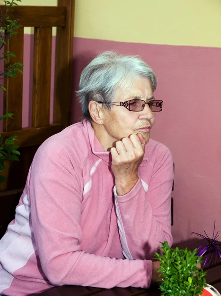 Satisfied elderly woman — Stock Photo, Image