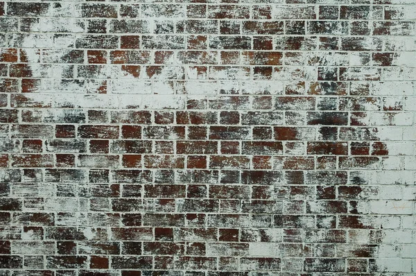 Окрашенная старая кирпичная стена — стоковое фото