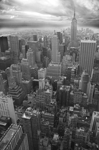 New York black and white vertical photo, Empire State Building visible in distance