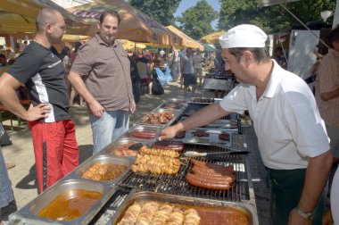 Grilling at local market clipart