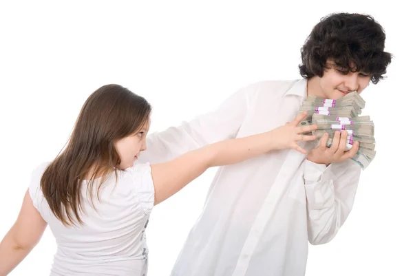 The girl wants to take away a pile of money from guy — Stock Photo, Image