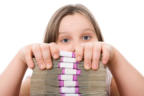 Menina bonita e pilha de dinheiro — Fotografia de Stock