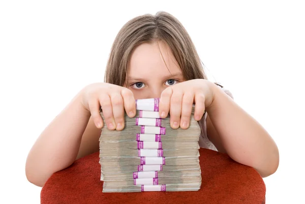 Beautiful girl and pile of money — Stock Photo, Image