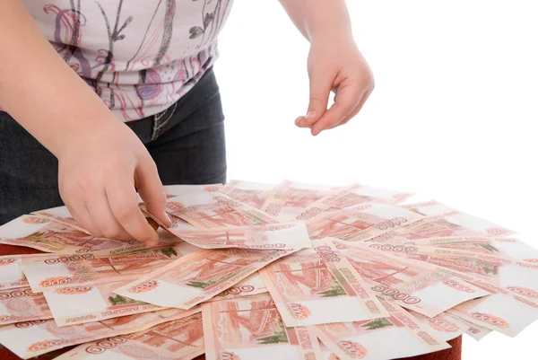 De tiener verzamelt geld in een hand — Stockfoto