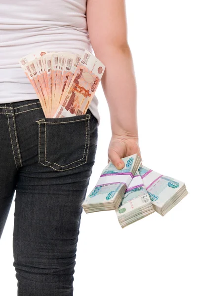 Money sticks out of a hip-pocket and in hands — Stock Photo, Image