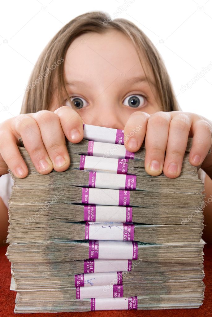 Beautiful girl and pile of money