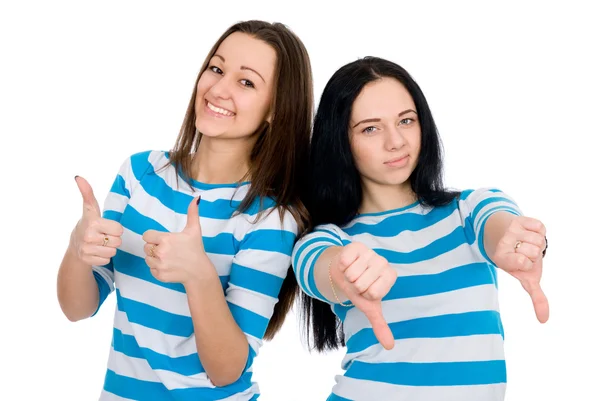 Two attractive girls show thumbs — Stock Photo, Image