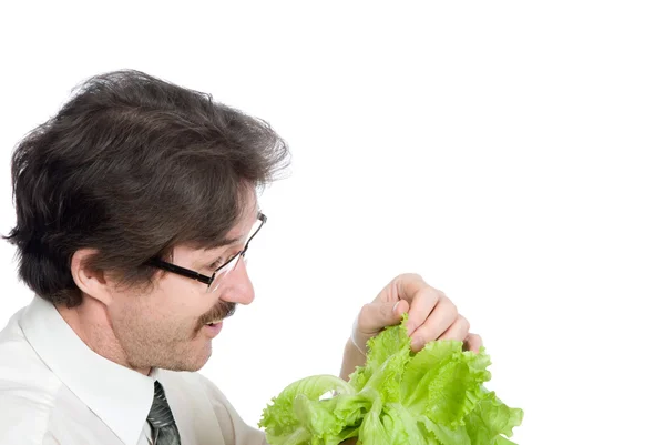 Mens verheugt zich blad van de salade — Stockfoto