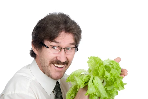 Человек радуется листу салата — стоковое фото