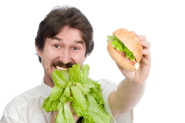 Man prefers salad instead of hamburger — Stock Photo, Image
