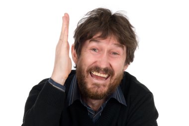 Man with his hand raised ready to answer a question. clipart