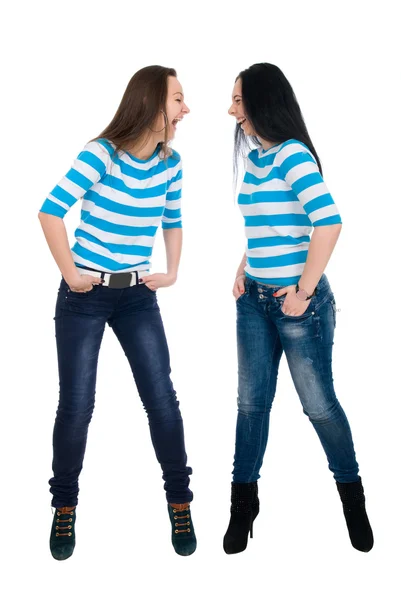 Duas meninas vigorosas em coletes listrados — Fotografia de Stock