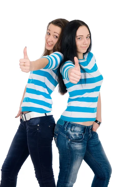 Zwei glückliche Mädchen, die Daumen zeigen — Stockfoto