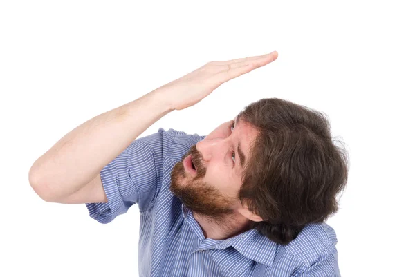 Mann auf weißem Untergrund versteckt seinen Kopf mit der Hand — Stockfoto