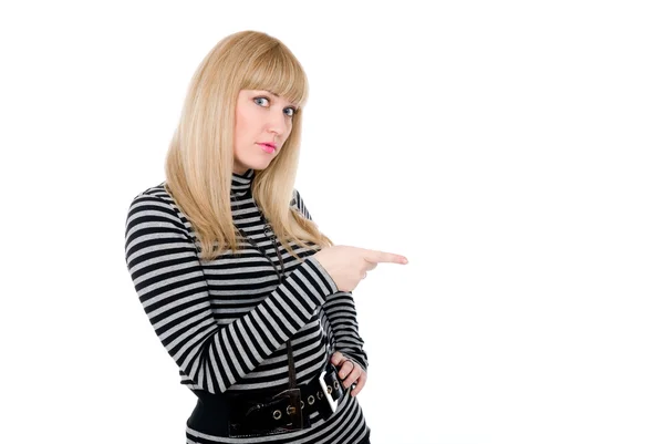 Astonished female pointing at something aside with her index fin — Stock Photo, Image