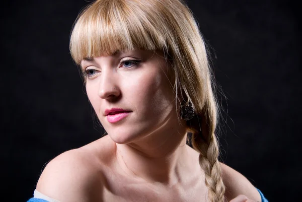 The beautiful girl with a plait against — Stock Photo, Image