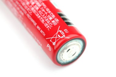 Battery labelled with the crossed out wheeled bin symbol clipart