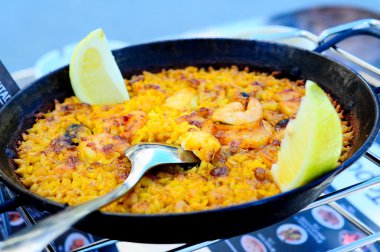 Seafood Paella in a Paella Pan, outdoor photo clipart
