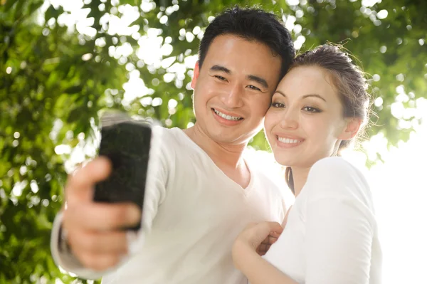 Asian Couple Taking Photographs — Stock Photo, Image