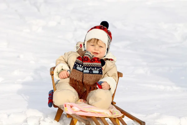 Boy on sledge — Stock Photo, Image