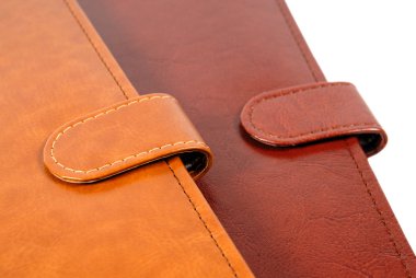 Leather covers of personal organizers clipart