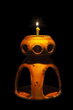 Ceramic lamp with candle clipart