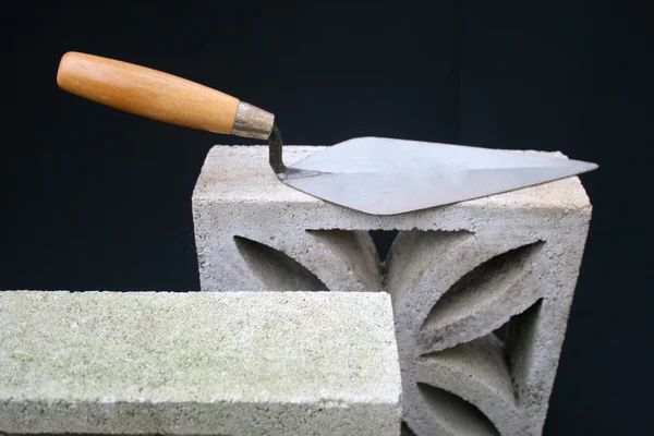 Trowel on a block. — Stock Photo, Image