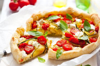 Quiche with tomato and zucchini clipart