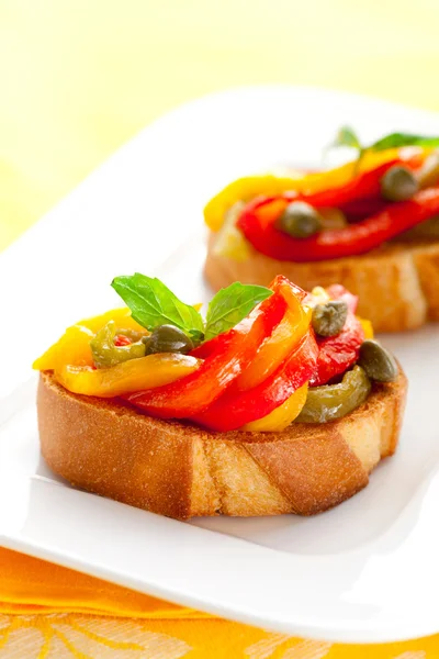 Bruschetta with bell pepper salad — Stock Photo, Image