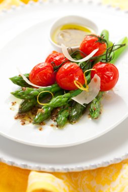 Green asparagus with roasted tomatoes clipart