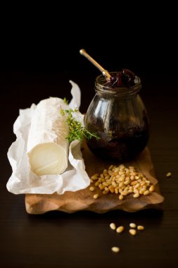 Goat cheese,onion jam,pine nut and thyme clipart