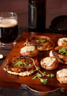 Mushroom tarte tatin and stuffed mushrooms clipart