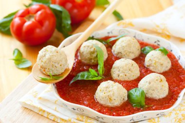 Chicken meatballs and tomato sauce clipart