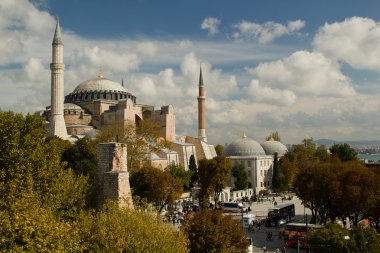 Hagia Sofia in Istanbul - view from top, with trees and clouds clipart