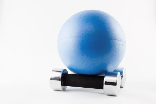 stock image Blues Fitness ball position on two silver hand weights