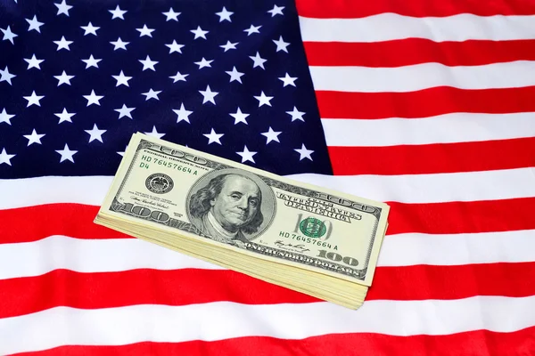 Dólares e banner dos EUA — Fotografia de Stock