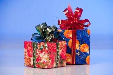 New Year's gifts in festive packaging clipart