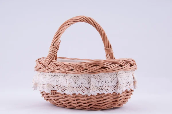 Wicker basket on a white background. — Stock Photo, Image