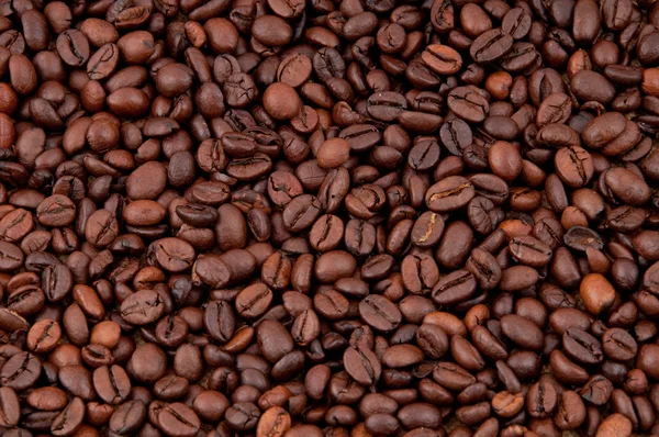 Bruine koffie, achtergrond textuur, close-up — Stockfoto