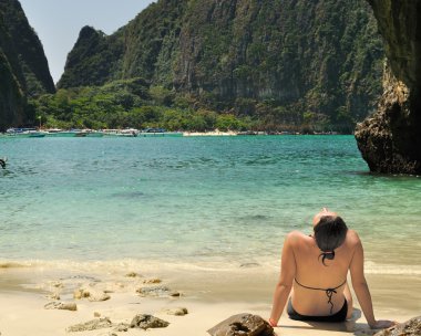 Woman tanning on Maya Bay. Thailand clipart