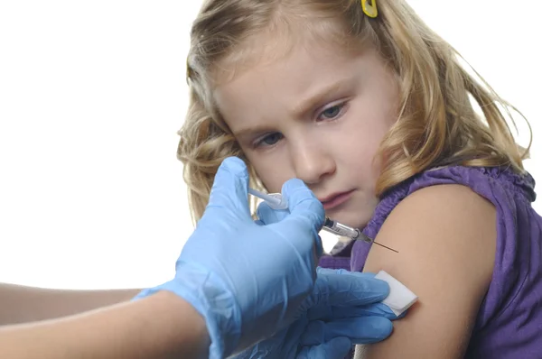 Vaccinazioni infantili su un bianco — Foto Stock