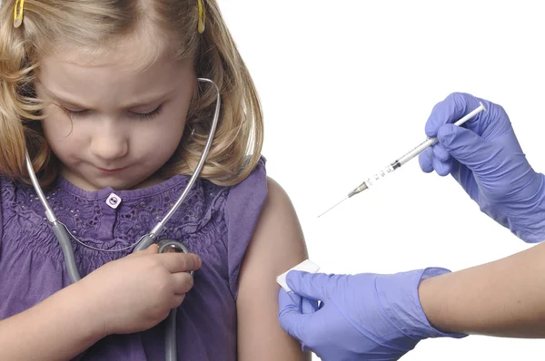 Vacunaciones infantiles en un blanco —  Fotos de Stock
