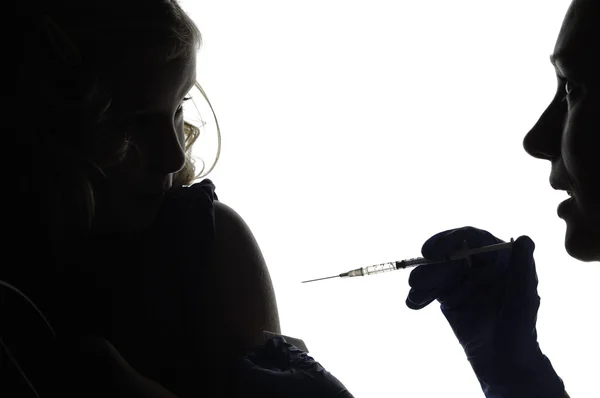 Vacinação de crianças em um branco — Fotografia de Stock