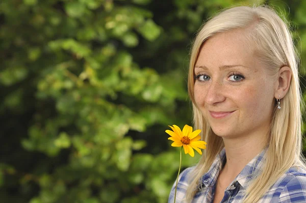 Woman with flower. — Stock Photo, Image