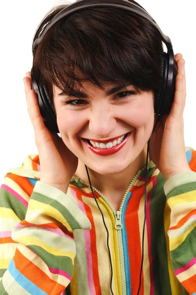 Jonge vrouw luisteren naar muziek. — Stockfoto