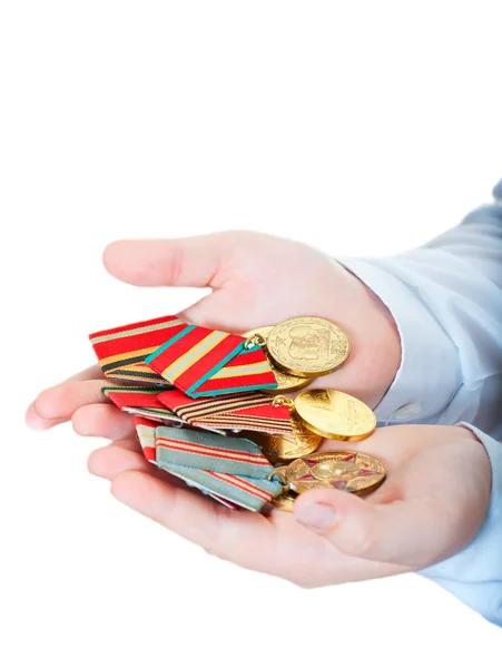 Boy holds in a hand Medals — Stock Photo, Image