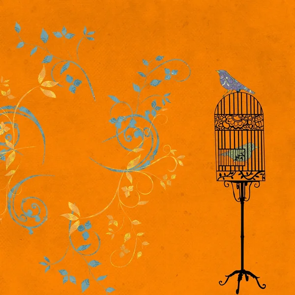 Ptak w klatce na pomarańczowym tle — Zdjęcie stockowe
