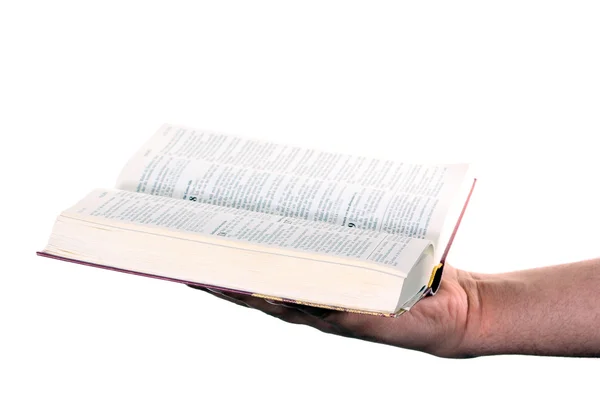 Orando de la mano sostiene una biblia abierta — Foto de Stock