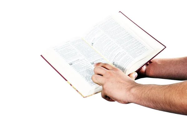 Be hand håller en öppen bibel — Stockfoto