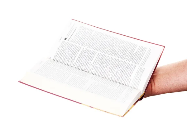 La mano di preghiera tiene una bibbia aperta — Foto Stock